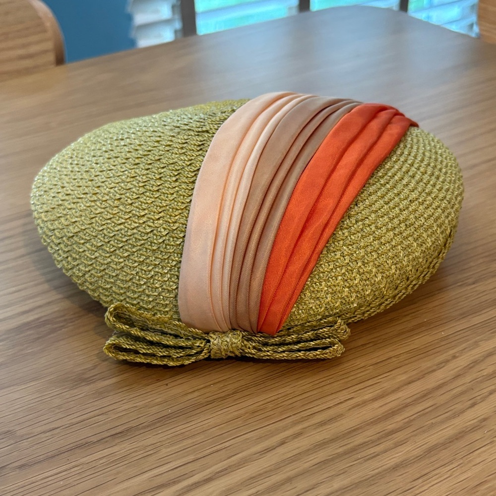 Vintage 1950’s pillbox hat. Yellowish green with ribbon trim.